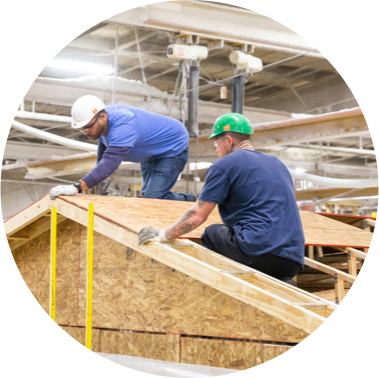 Clayton Addison team members building a manufactured home inside the Addison plant