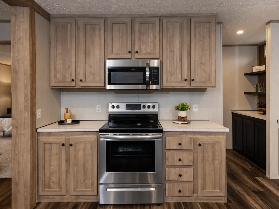 Microwave range hood Appliances selection from Clayton Russellville Decor & Options
