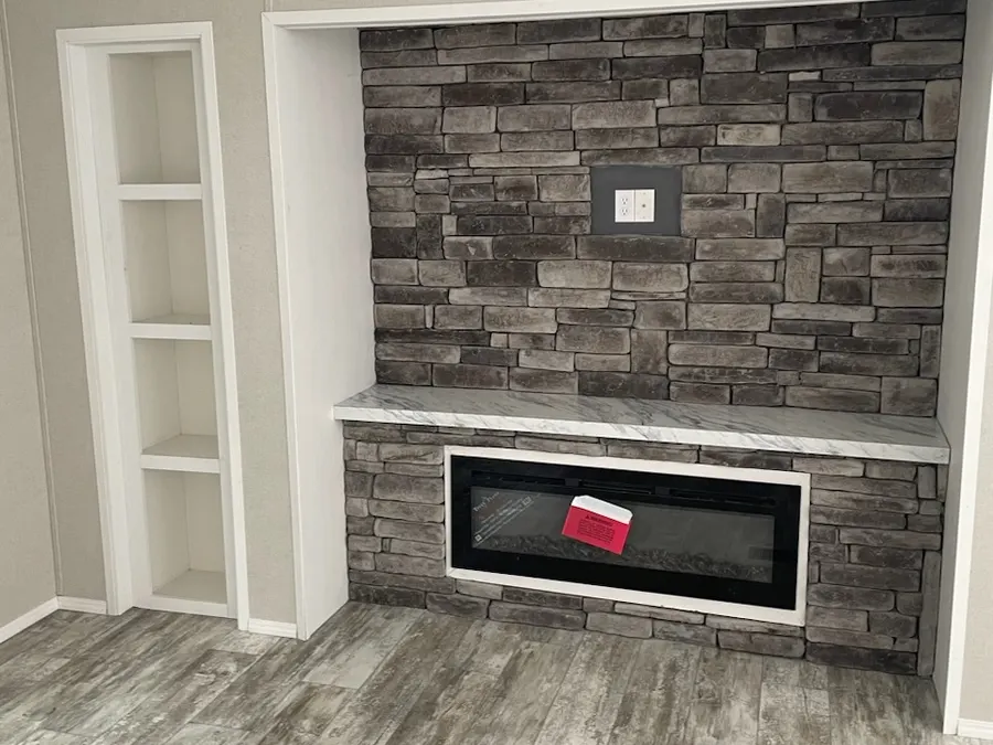 Full Rock entertainment center over electric rock fireplace Popular Options selection from Clayton Savannah Decor & Options