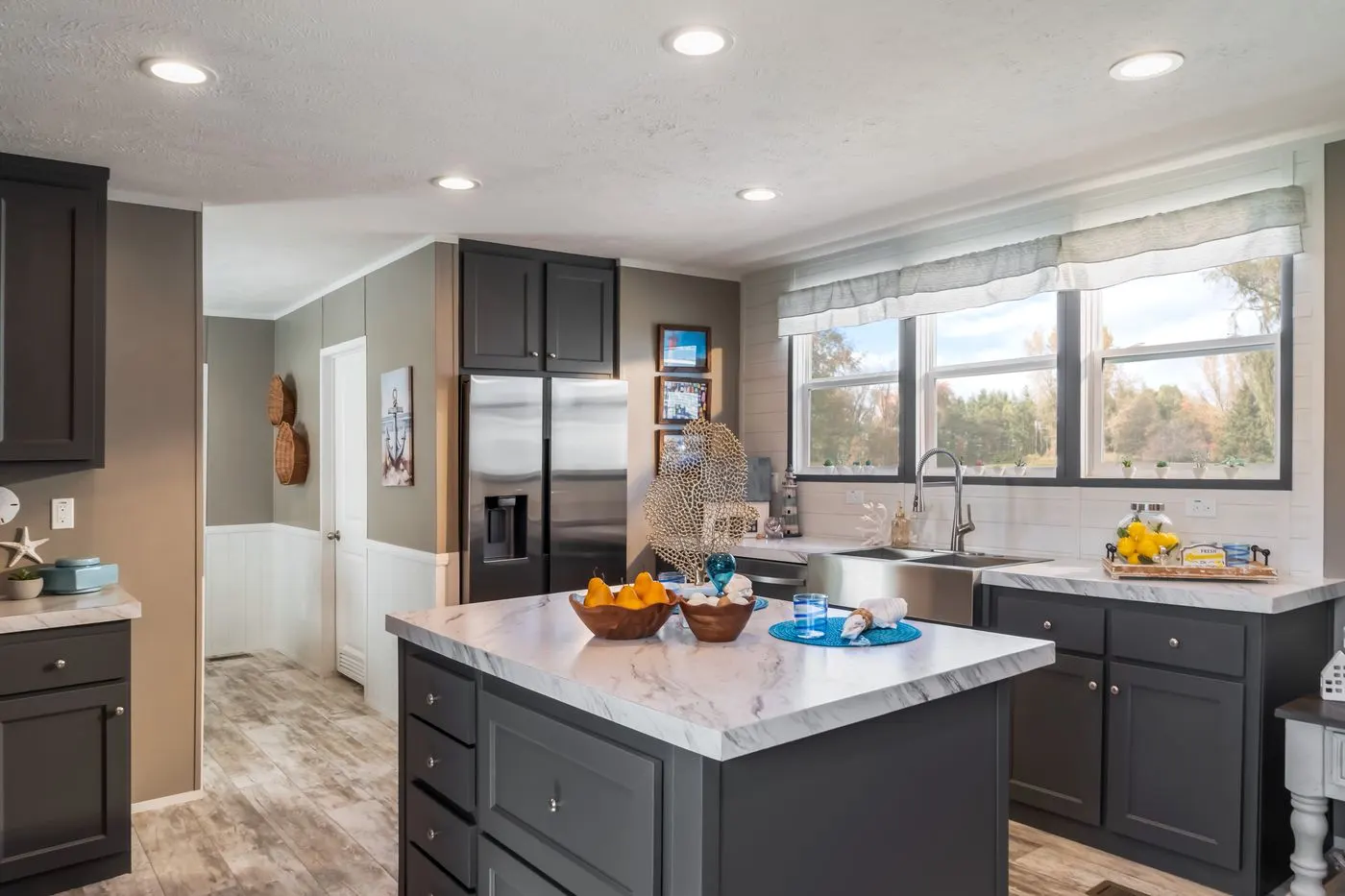 The THE DRIFTWOOD Kitchen. This Manufactured Mobile Home features 3 bedrooms and 2 baths.
