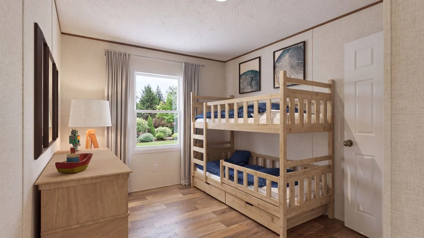 The CEDAR Guest Bedroom. This Manufactured Mobile Home features 3 bedrooms and 2 baths.