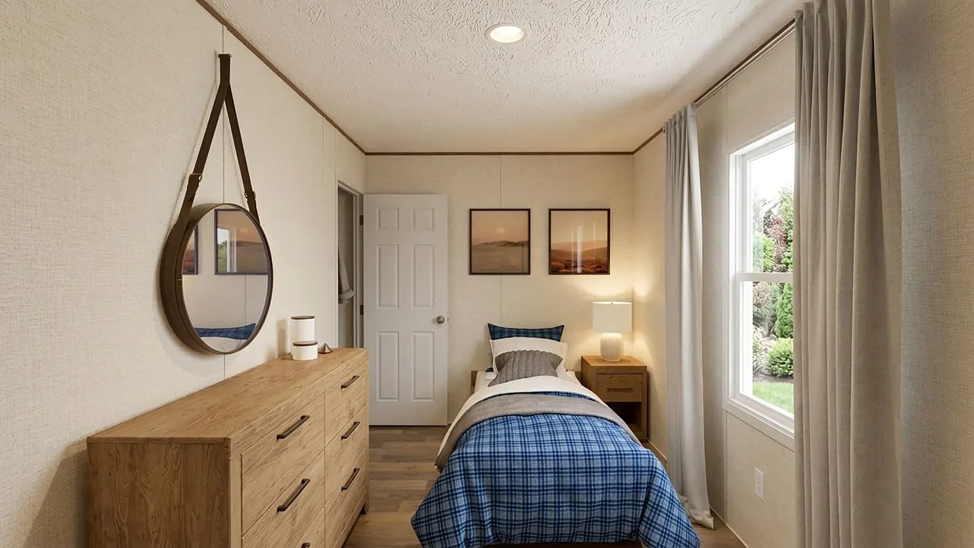 The ASPEN Guest Bedroom. This Manufactured Mobile Home features 3 bedrooms and 2 baths.