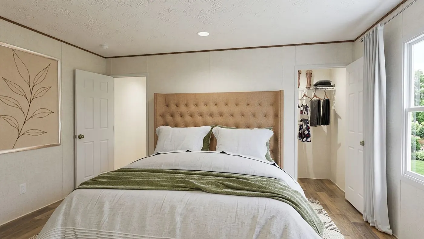 The ASPEN Primary Bedroom. This Manufactured Mobile Home features 3 bedrooms and 2 baths.
