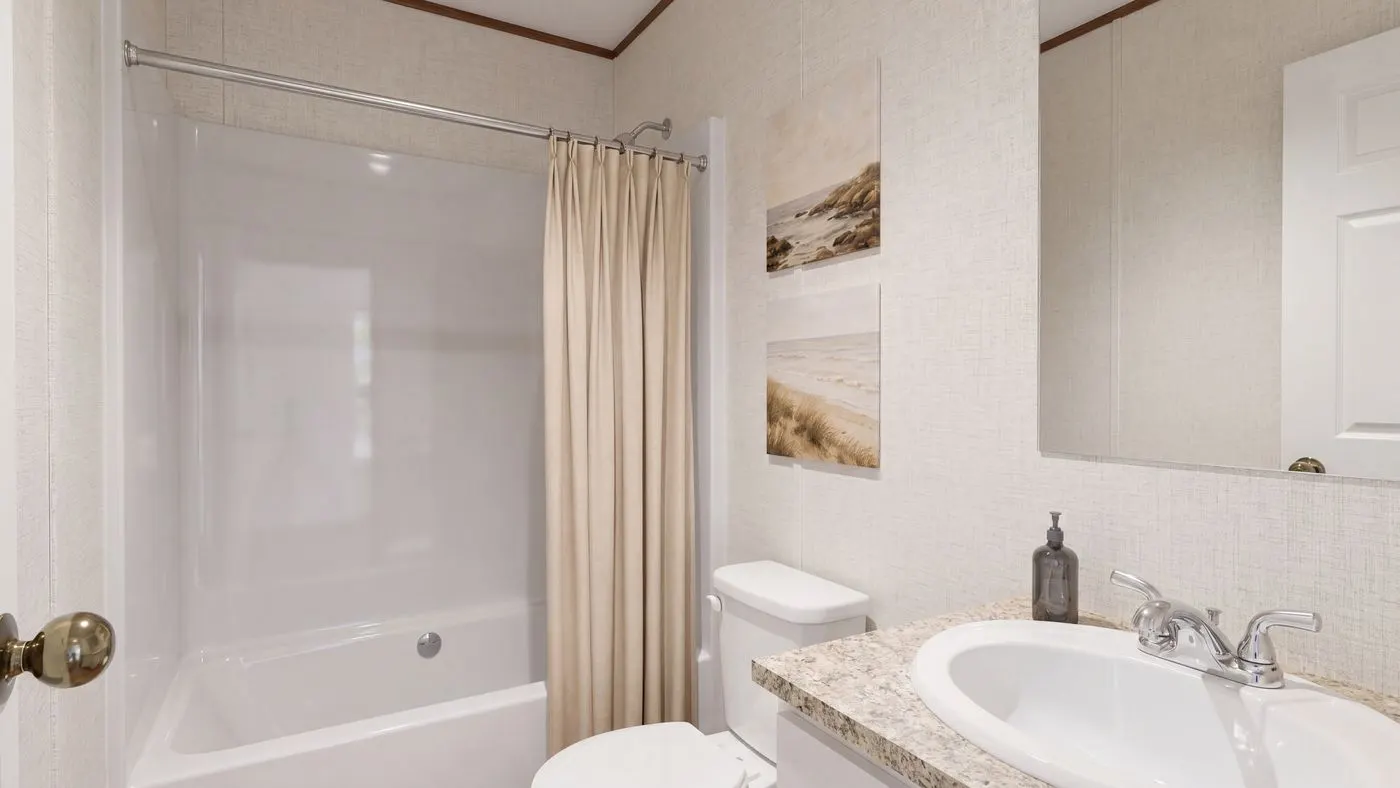 The SYCAMORE Guest Bathroom. This Manufactured Mobile Home features 4 bedrooms and 2 baths.