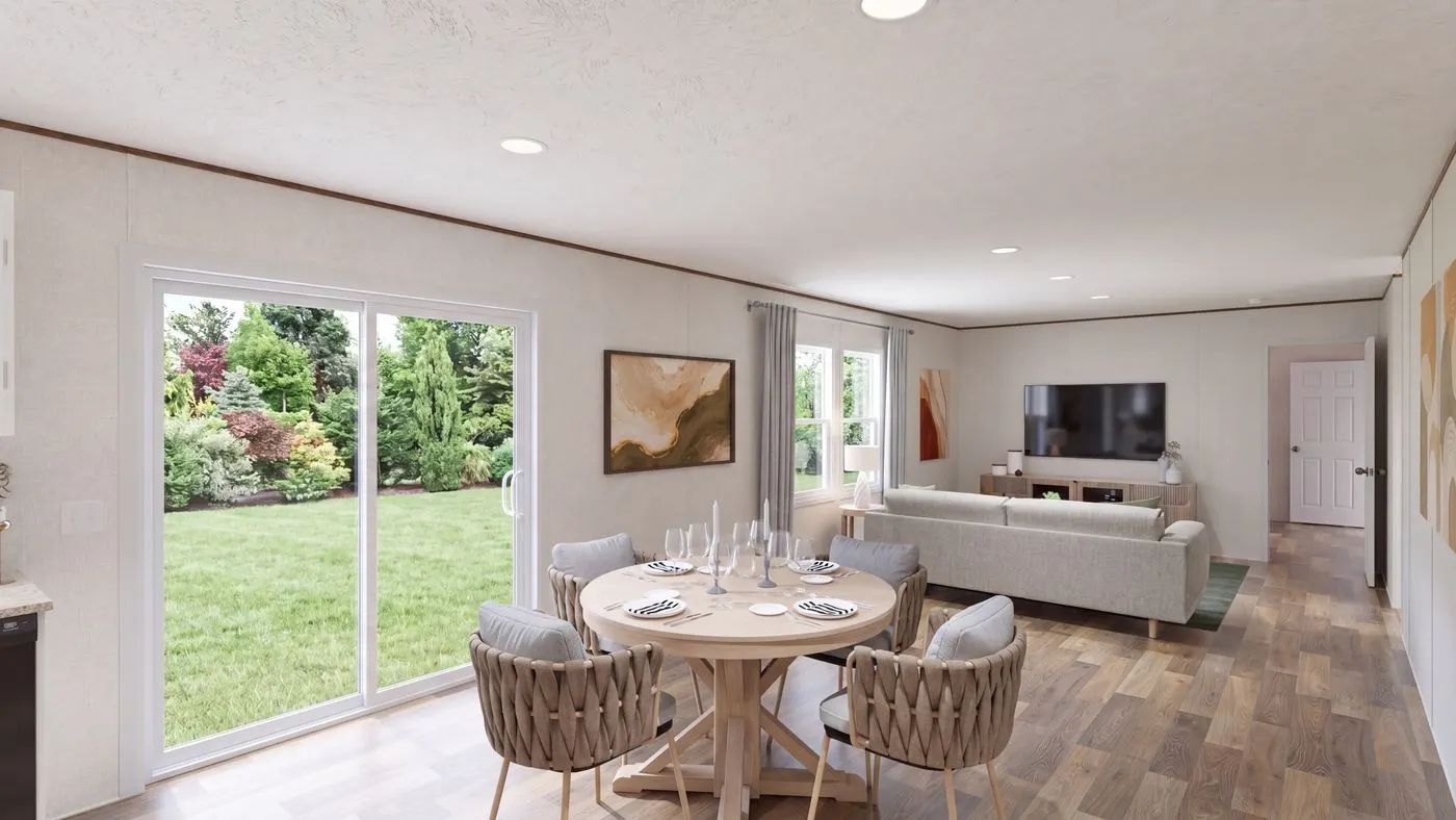 The SYCAMORE Dining Area. This Manufactured Mobile Home features 4 bedrooms and 2 baths.