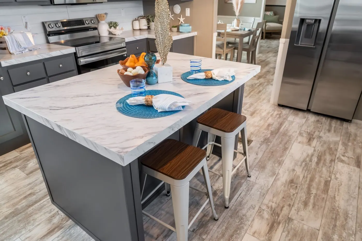 The THE DRIFTWOOD Kitchen. This Manufactured Mobile Home features 3 bedrooms and 2 baths.