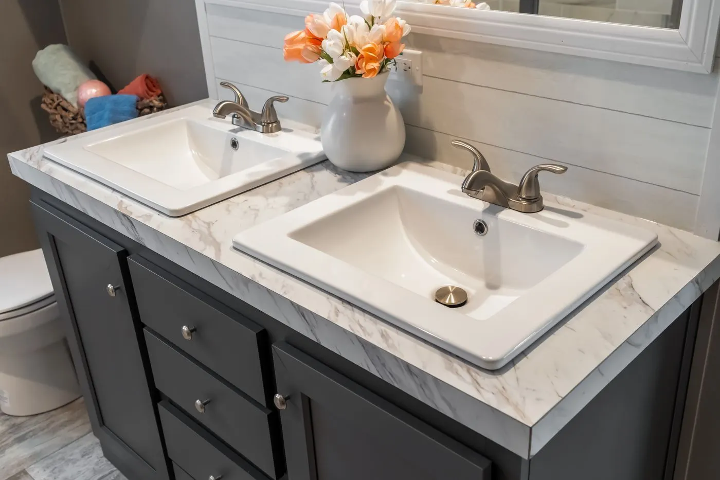 The THE DRIFTWOOD Primary Bathroom. This Manufactured Mobile Home features 3 bedrooms and 2 baths.