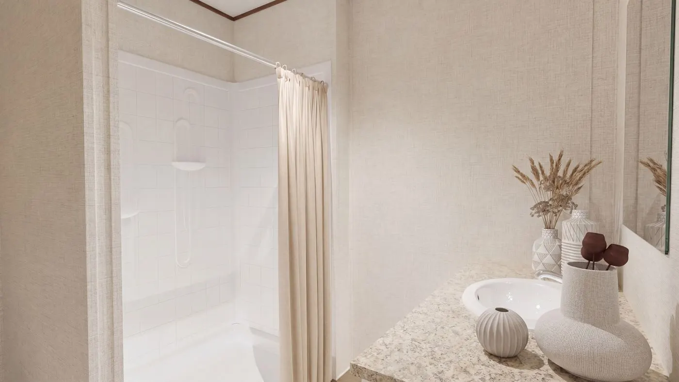 The SYCAMORE Primary Bathroom. This Manufactured Mobile Home features 4 bedrooms and 2 baths.