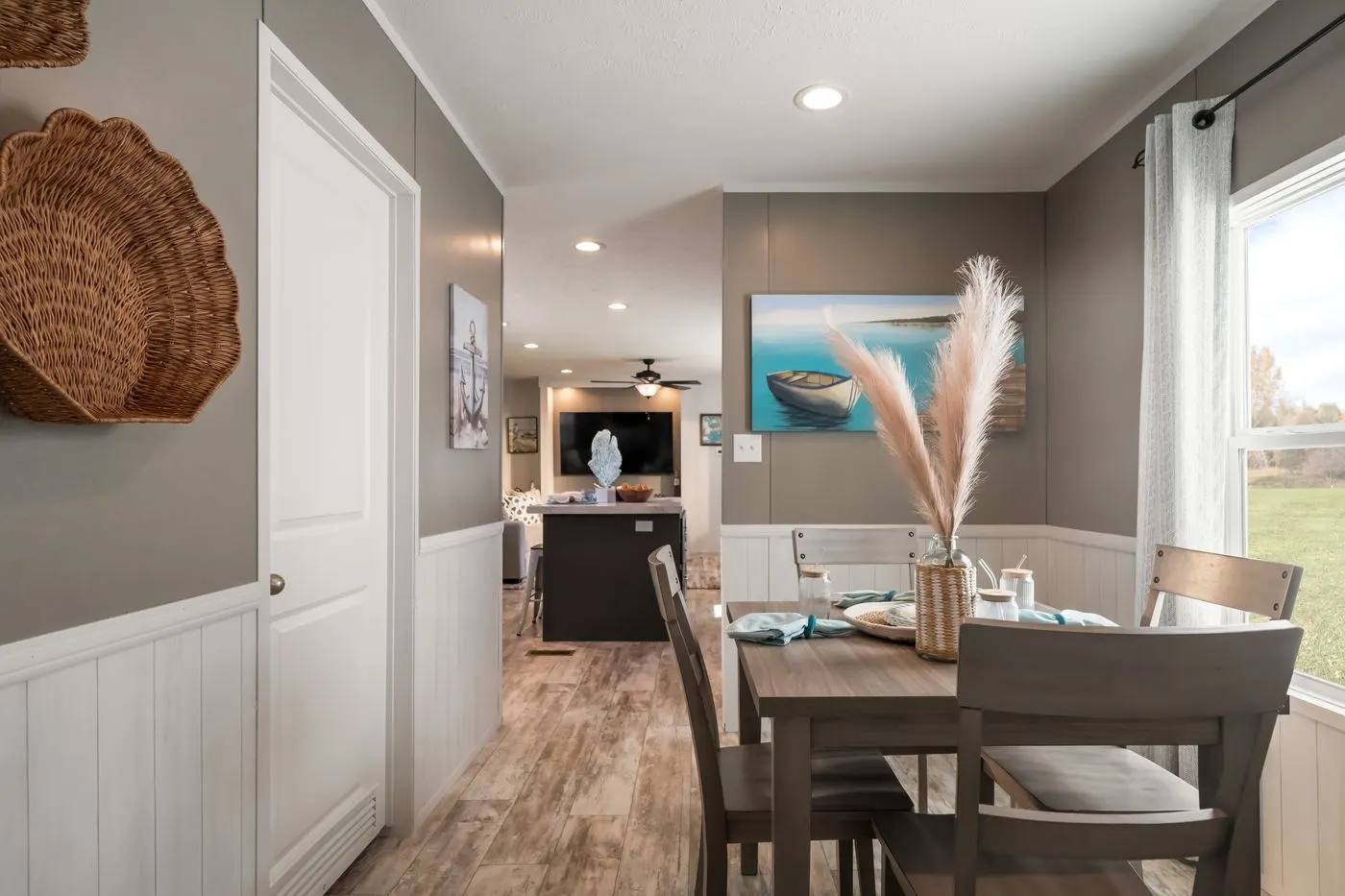 The THE DRIFTWOOD Dining Room. This Manufactured Mobile Home features 3 bedrooms and 2 baths.